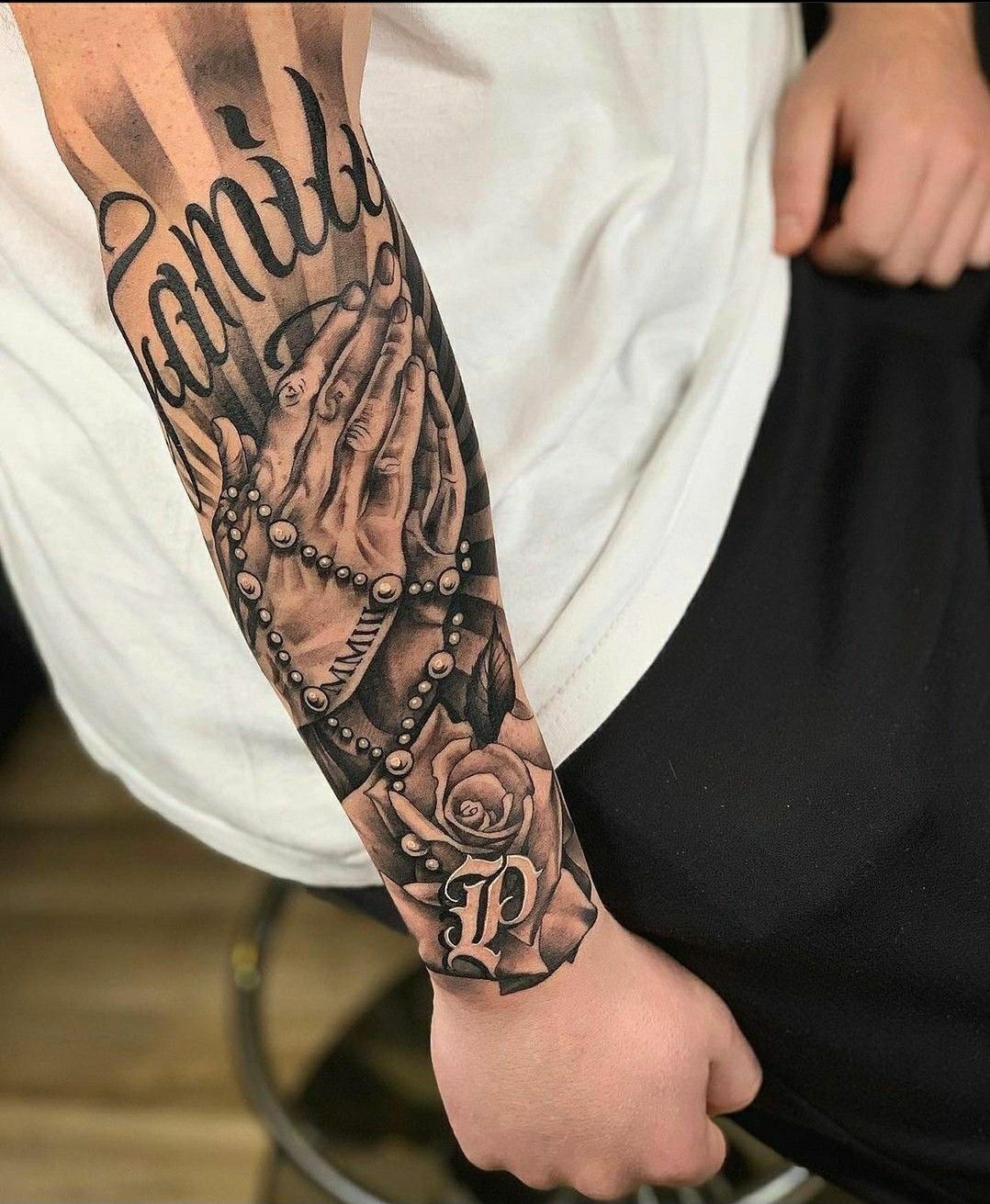 Praying Hands Arm Tattoo