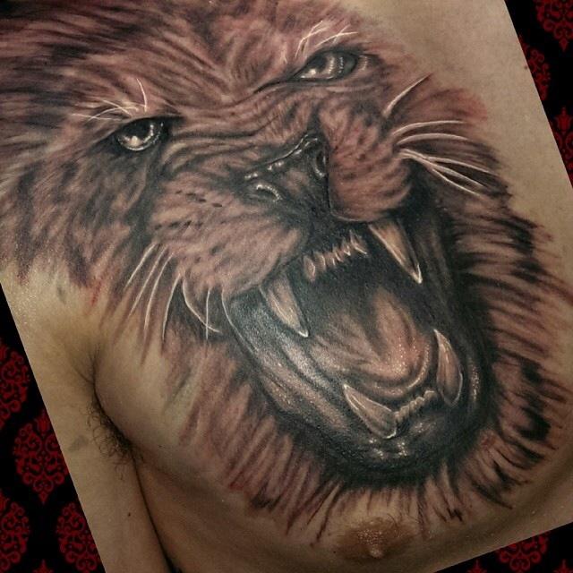 Roar With Style Lion Face Chest Tattoo Ideas For Brave Hearts