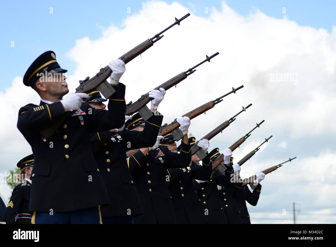 The Louisiana National Guard S Funeral Detail Conducts A 21 Gun Salute